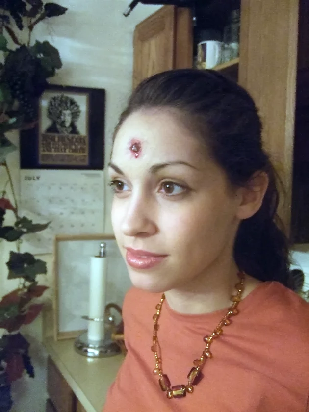 Emily Heitzer. (Amber with bullet hole.)