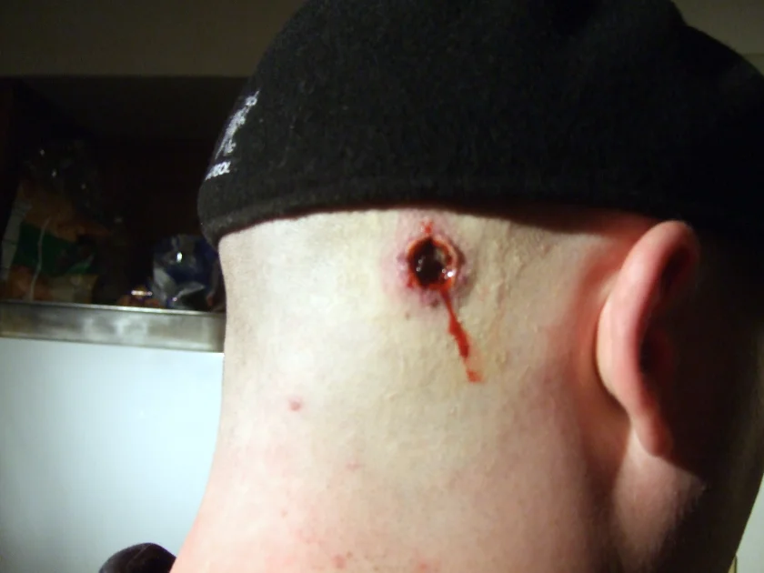 Nick Caminata as a thug.