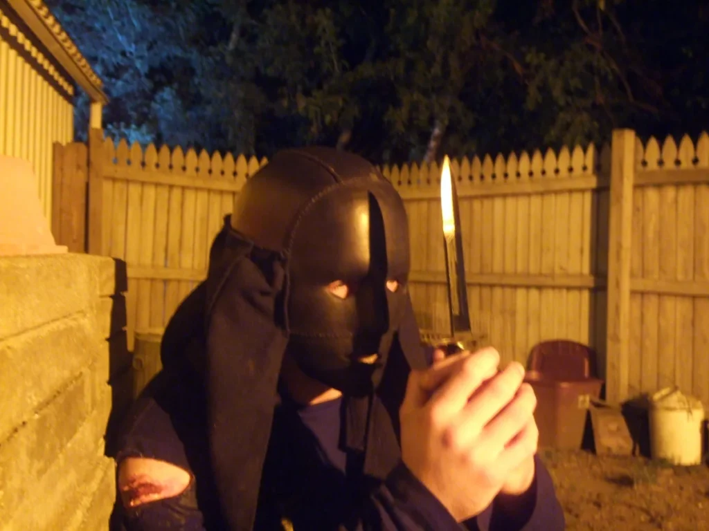 Joseph Janswig as "The Man in the Mask".