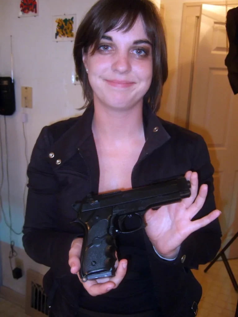 Jessica Marking as a thug. (With prop airsoft gun.)