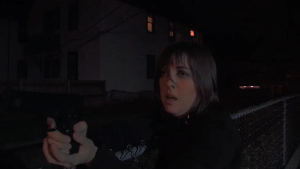 "Street thug". Alley. (Actor Jessica Marking.)