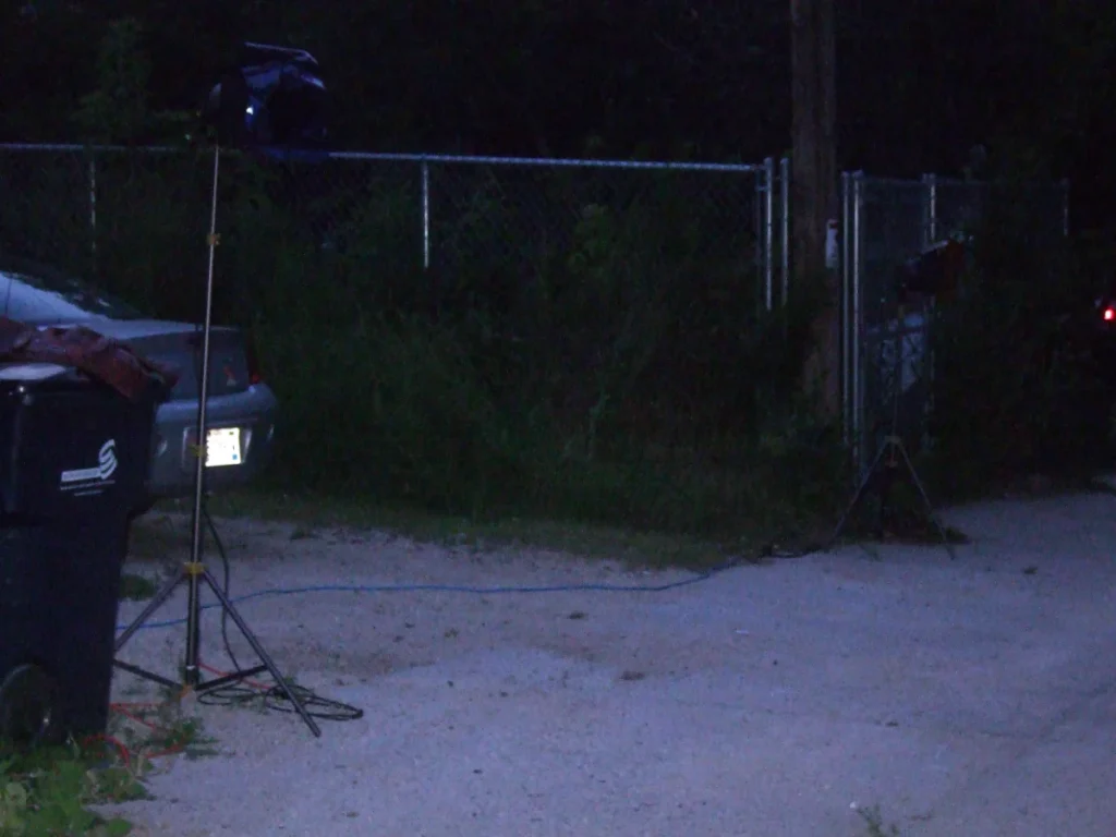 Alley night. Film lights on set.