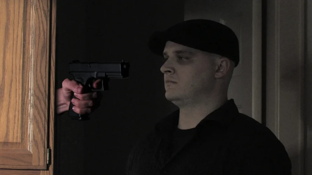 Composite of the gun in the kitchen from the front.